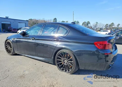 2016 BMW M5 z USA, uszkodzony, nr VIN WBSFV9C56GD595844